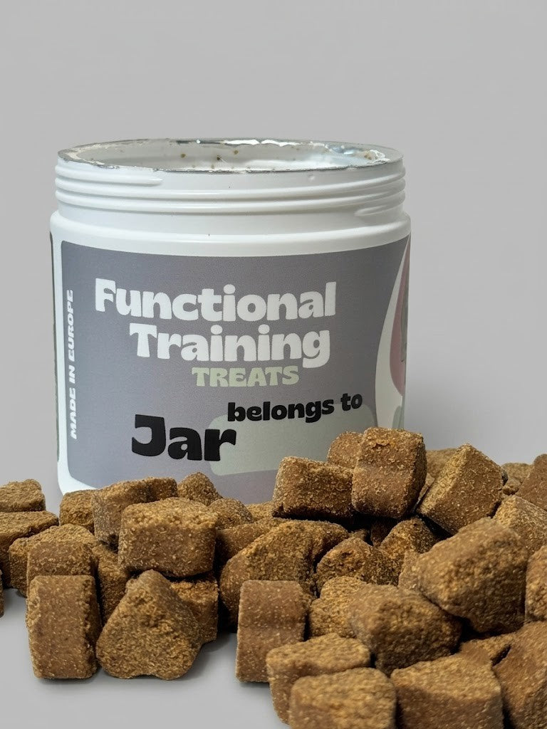 Jar of 'Functional Training Treats' with treats spilling out on a gray background
